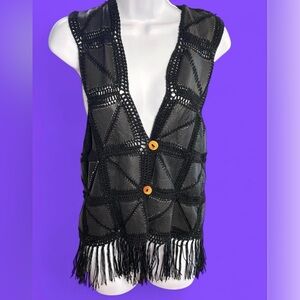 Vintage 1970’s black leather/crochet knit and fringe vest. Small-medium